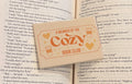 Cozy Book Genre Fridge Magnet 2.5x3.5in